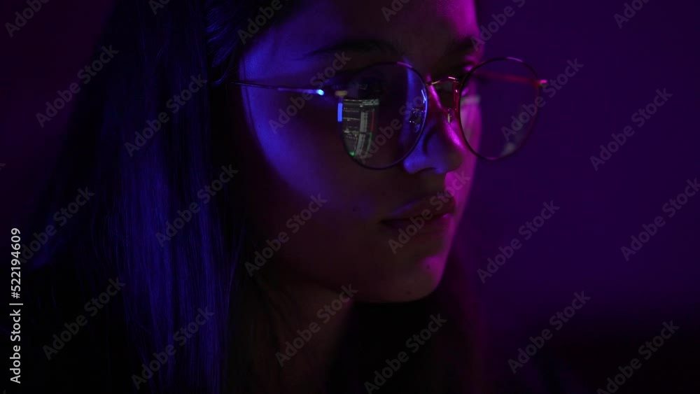 Woman working at night. Close view on face Woman working at night. Close view on face