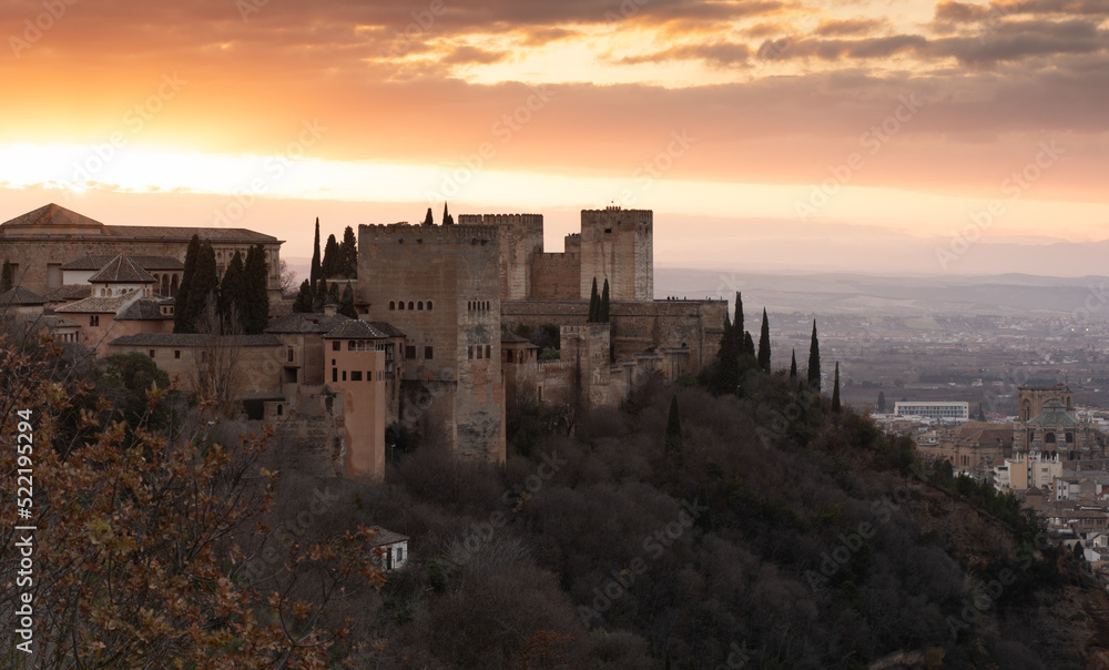 The ancient arabic fortress Alhambra at beautiful evening time, Granada, Spain, European travel landmark and most visited monument in all of Spain
