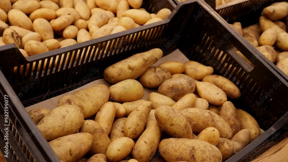 Close-up of new potatoes in boxes in the supermarket. Close-up of new potatoes in boxes in the supermarket.