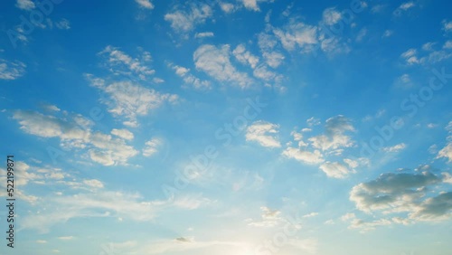 Dynamic cloud time-lapse from calm blue skies to cloudy. Puffy fluffy white clouds. Time lapse.