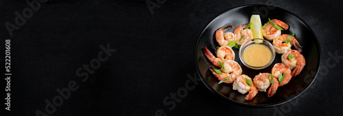 Batter fried crispy shrimp appetizer, selective focus. Banner