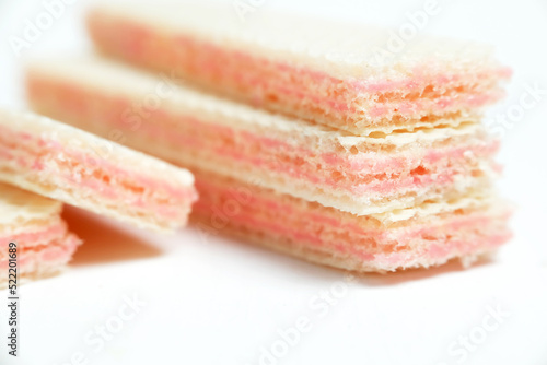 Wafers with raspberry yoghurt isolated on a white background
