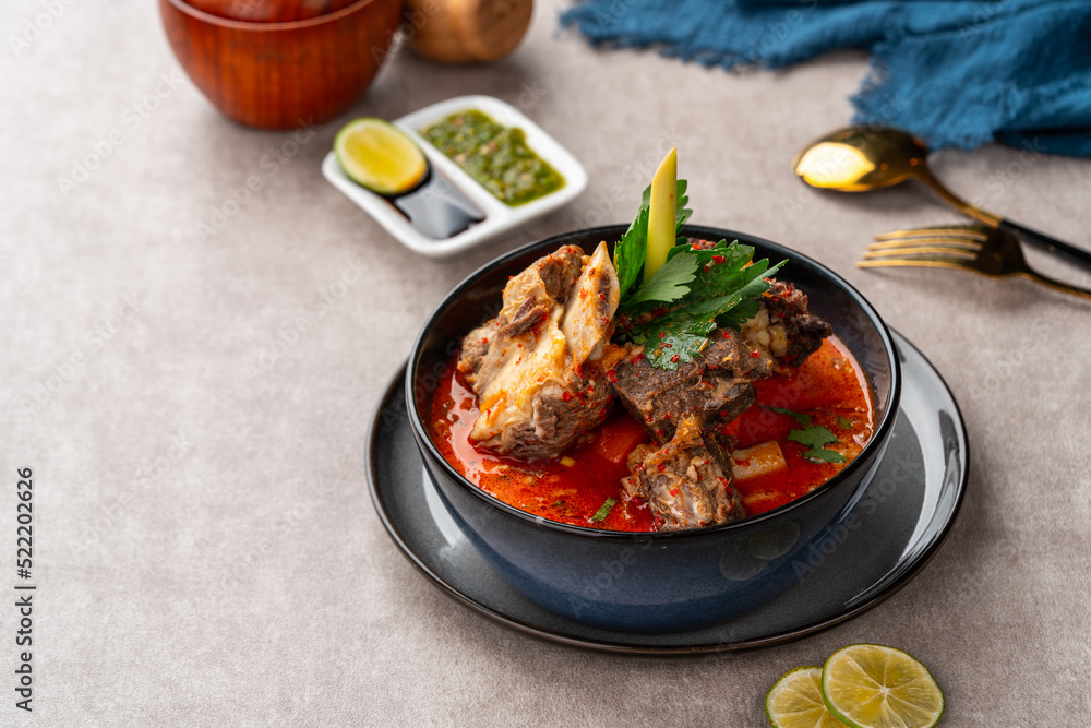 Soto Tangkar is Betawi food. The name Tangkar itself is a term for beef ribs in Betawi language. Soto Tangkar cooked in thin coconut milk soup spiced with red curry. Soto Tangkar is Betawi food. The name Tangkar itself is a term for beef ribs in Betawi language. Soto Tangkar cooked in thin coconut milk soup spiced with red curry.