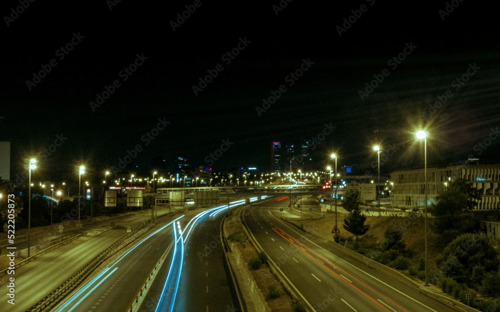Traffic light trails in downtown of Madrid, Spain.