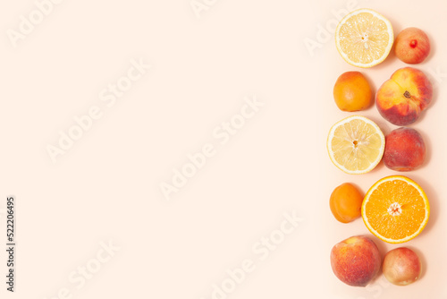 Bright tropical fruits on a light background