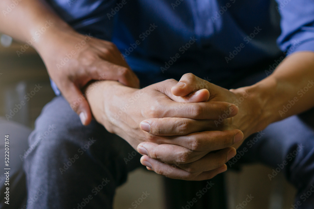 Fototapeta premium Stressed man are treated by a psychologist or psychiatrist in a psychiatric clinic or hospital. Patients reported symptoms of depression, stress, irritability, and life problems.