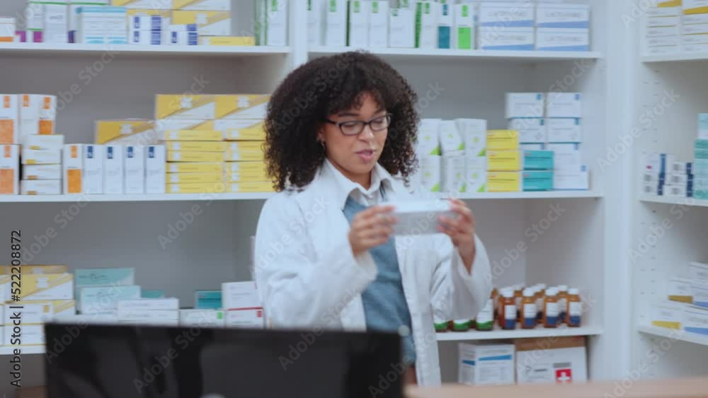 Pharmacist talking, helping and showing customer medicine in pharmacy and explaining prescription dosage. Medical healthcare professional with afro selling over the counter drugstore medication cream Pharmacist talking, helping and showing customer medicine in pharmacy and explaining prescription dosage. Medical healthcare professional with afro selling over the counter drugstore medication cream