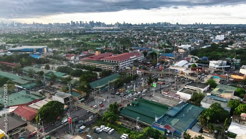 Nice drone view of huge town of Taytay Rizal, busy intersection highway, business center and buildings around the town photo