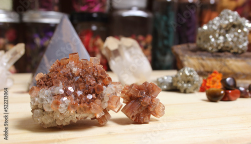 Aragonite Carbonate Crystals With Pyramid in Background photo