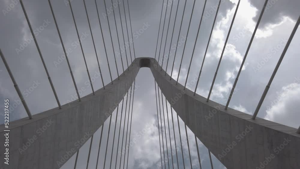 Low angle rotation of cable stayed suspension bridge featuring tower ...