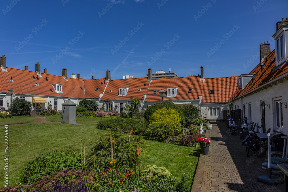View of Zandvoort national monument: Gasthuishofje (Guest house courtyard) - first structure in Zandvoort's reconstruction plan. Zandvoort, North Holland, the Netherlands.