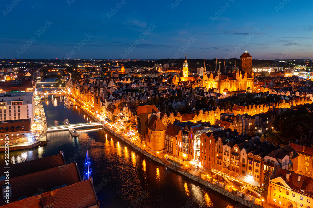 Beautiful Gdansk over the Motlawa river at dusk. Poland Beautiful Gdansk over the Motlawa river at dusk. Poland