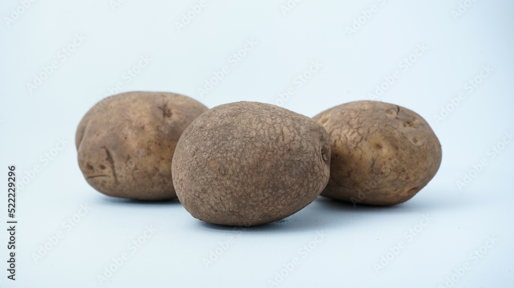 New potato isolated on white background close up New potato isolated on white background close up