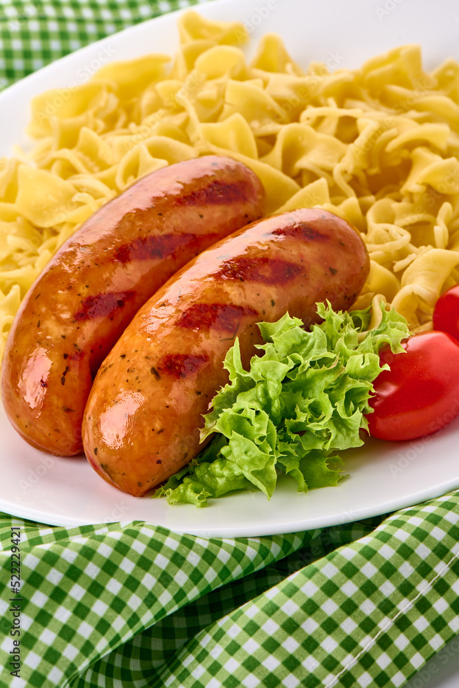 Close-up of roasted bratwurst sausages. Oktoberfest dishes. Close-up of roasted bratwurst sausages. Oktoberfest dishes.