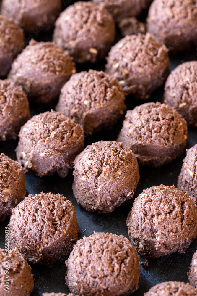 Sweet cocoa cookies. Freshly baked cocoa cookies in a tray. close up Sweet cocoa cookies. Freshly baked cocoa cookies in a tray. close up