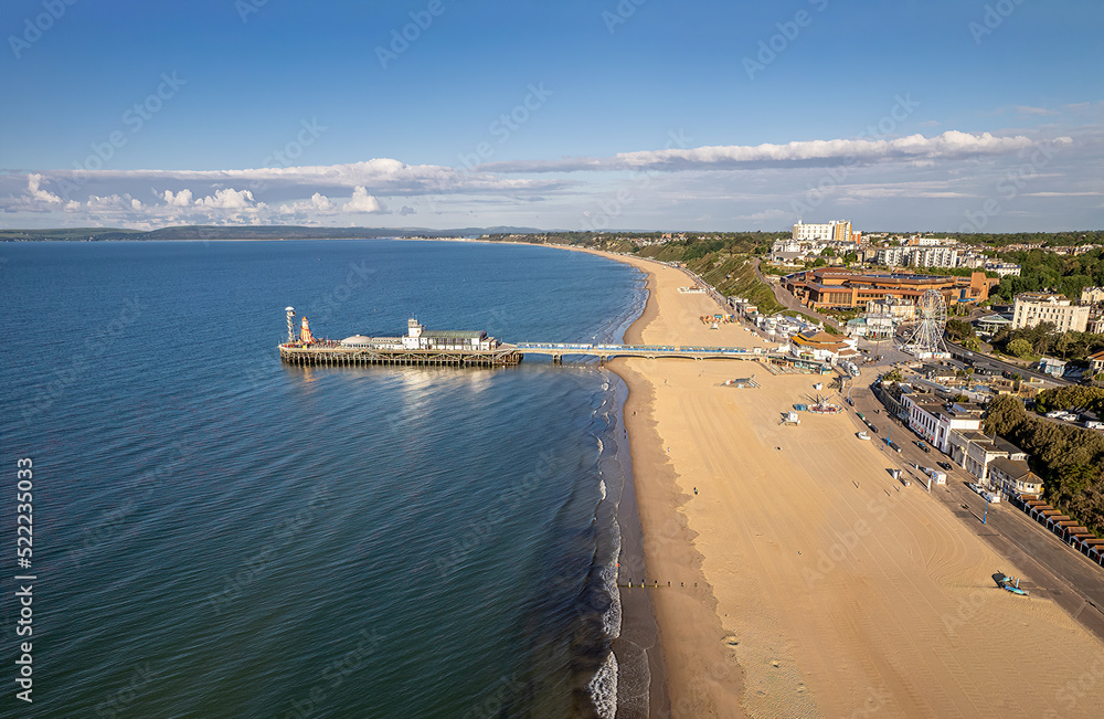 The drone aerial view of the Bournemouth beach, Observation Wheel and Pier. Bournemouth is a coastal resort town in the Bournemouth, Christchurch and Poole council area of Dorset, England.