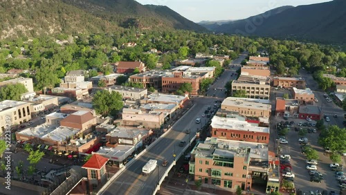 Aerial reveal of the old town of Glenwood Springs, Colorado photo