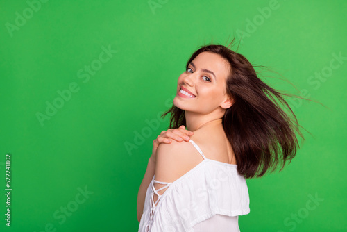 Profile photo of nice satisfied lady toothy smile hand touch shoulder isolated on green color background