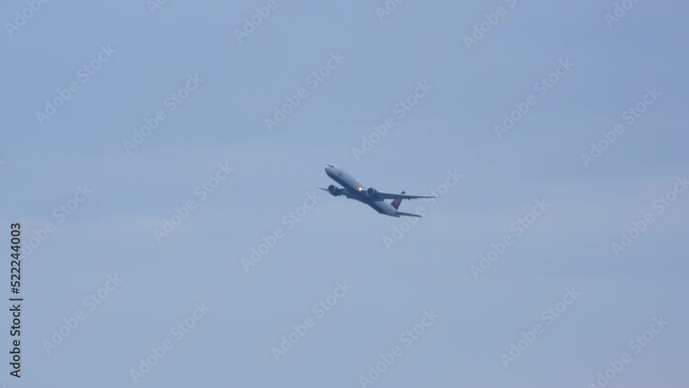 Plane is taking off in Toronto Canada, Blue-grey sky in the background. traveling Plane is taking off in Toronto Canada, Blue-grey sky in the background. traveling