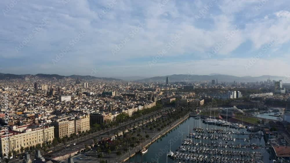 Aerial view overlooking the El Gòtic cityscape and the marina of Barcelona, Spain - circling, drone shot Aerial view overlooking the El Gòtic cityscape and the marina of Barcelona, Spain - circling, drone shot