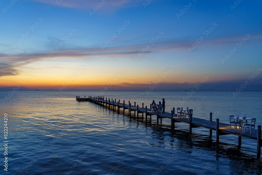 Cambodia. The seaside resort of Kep. Krong Kep Province. The pontoon of the Sailing Club hotel at dusk