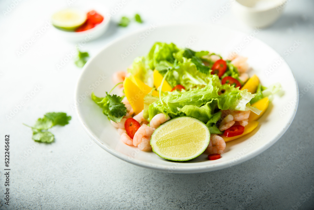 Fresh green salad with shrimps and mango Fresh green salad with shrimps and mango
