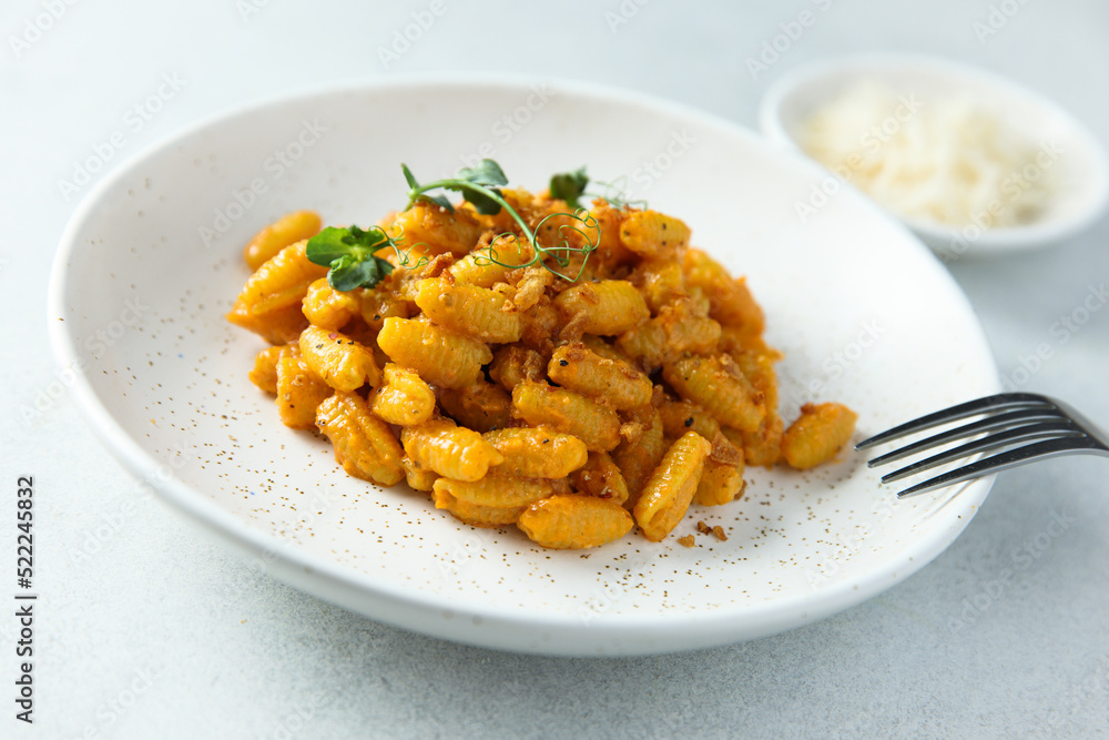 Homemade pasta with red pesto Homemade pasta with red pesto