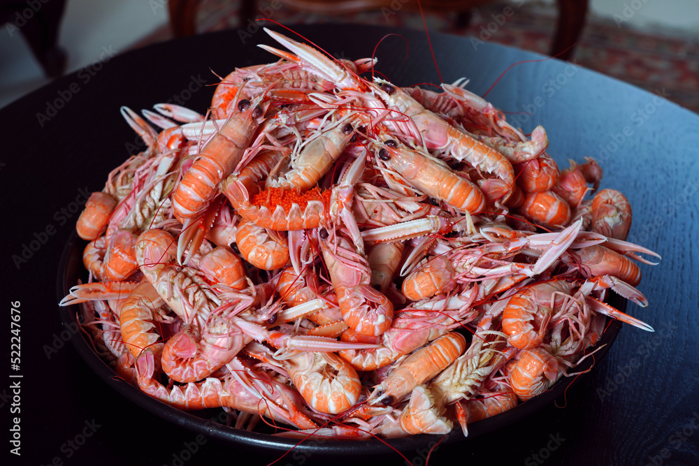 Platter of fresh cooked langostino in Brittany, France Platter of fresh cooked langostino in Brittany, France