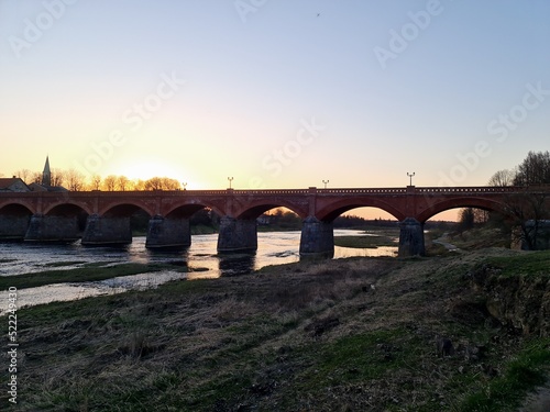Old brick bridge over the river