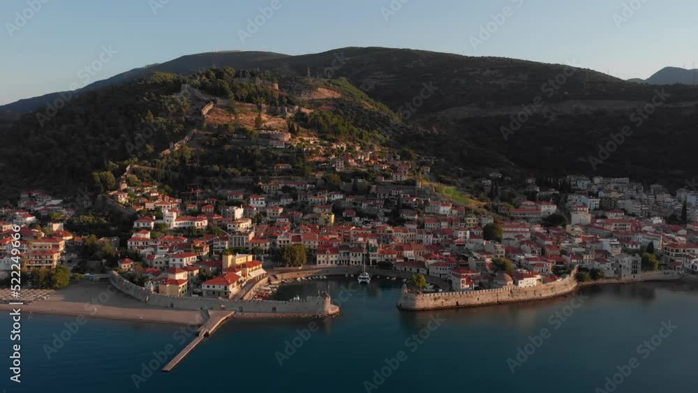 Aerial point of interest shot of Nafpaktos port Greece in the morning dim light Aerial point of interest shot of Nafpaktos port Greece in the morning dim light