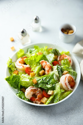 Traditional Caesar salad with shrimps © marysckin