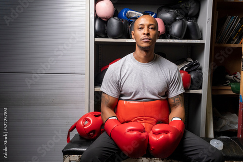 Portrait of mature man in boxing gloves