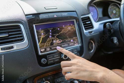 Young�woman using car navigation, close up of hand © Cultura Creative