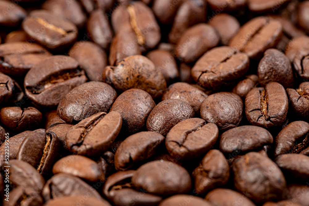 Roasted coffee beans, can be used as background close-up. Fragrant Arabica coffee. Roasted coffee beans, can be used as background close-up. Fragrant Arabica coffee.