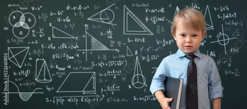 Bild auf Leinwand a genius kid, a child prodigy, a boy in a shirt with a tie on the background of