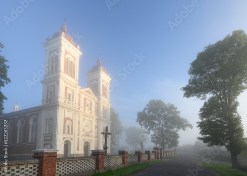 Obraz na płótnie Jurbarkas district, Lithuania. 08-08-2022 Seredzius St. John the Baptist Church - a Catholic church in the town of Seredžius, Jurbarkas district, at the confluence of the Dubysa and Nemunas rivers. w salonie