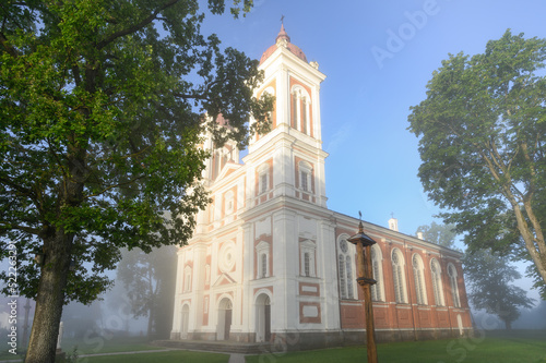 Obraz na płótnie Jurbarkas district, Lithuania. 08-08-2022 Seredzius St. John the Baptist Church - a Catholic church in the town of Seredžius, Jurbarkas district, at the confluence of the Dubysa and Nemunas rivers. w salonie