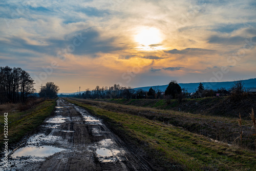 Sunset over dirt road