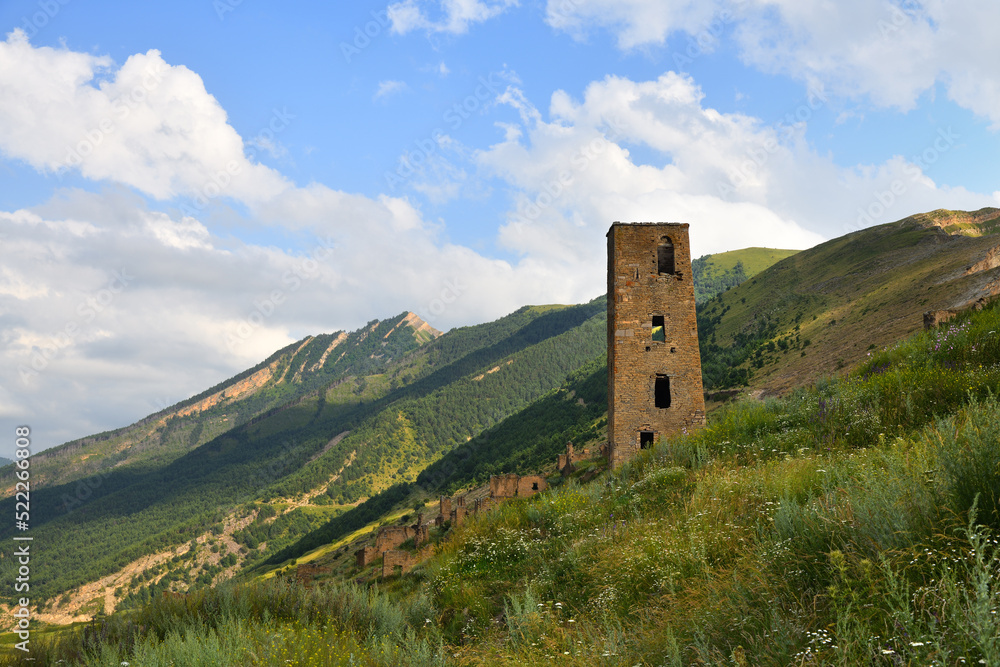 Tower of old village Goor in Dagestan, Russia. Panoramic view of the ancient Goor settlement Tower of old village Goor in Dagestan, Russia. Panoramic view of the ancient Goor settlement