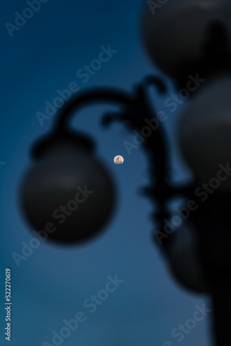 Moon with lamp in the foreground