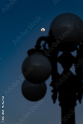 Moon with lamp in the foreground