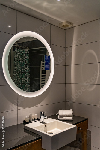 hotel bathroom with modern mirror