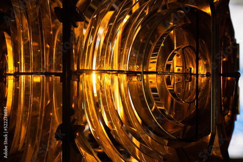 Rotating lighthouse lamp with a Fresnel lenses