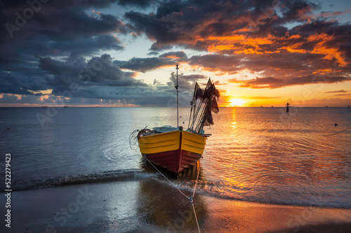 Fototapeta Naklejka Na Ścianę i Meble -  Beautiful sunrise on the beach of Baltic Sea in Sopot, Poland