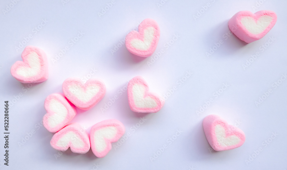 Rows of pink and white heart shaped marshmallow candies. Marshmallows in the shape of a heart on background. Valentine's day concept fill heart for full of love.