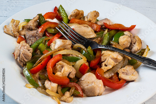 chicken  served with  sauteed peppers and onions