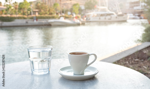 Fototapeta Naklejka Na Ścianę i Meble -  Turkish coffee cup on marble table, front view