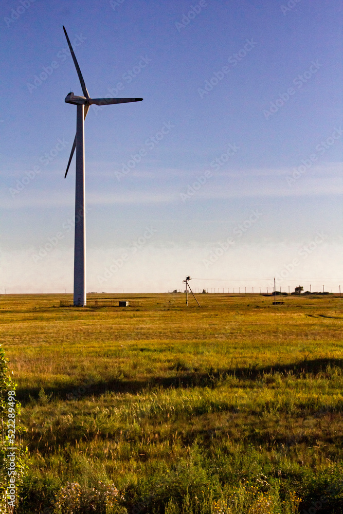 Fototapeta premium A wind generator in the north of Kazakhstan near the village of Novonikolskoye, the front and background blur