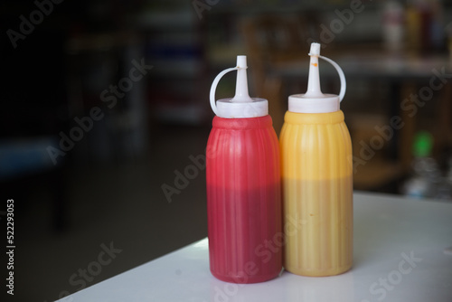 Tomato sauce with mustard  on the white table.