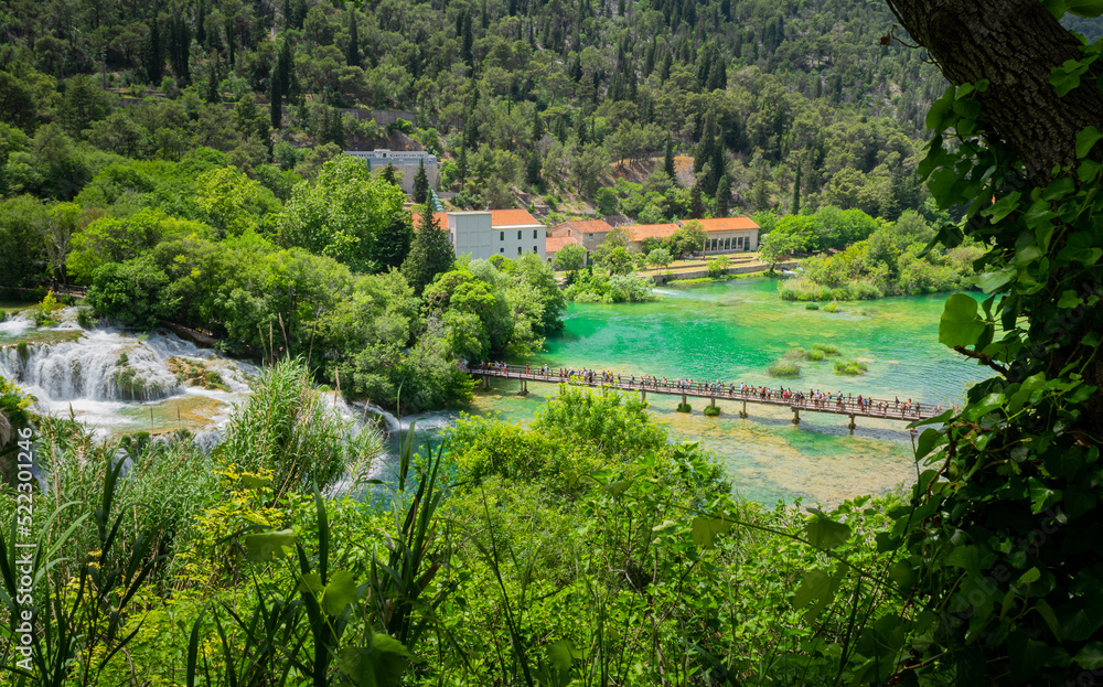 Main boardwalk near waterfalls and park buildings at Krka National Park